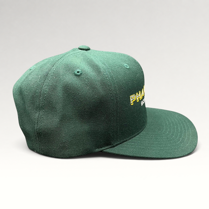 Raree Finds vintage forest green Pharmacy Boardshop snapback hat with structured crown and flat bill
