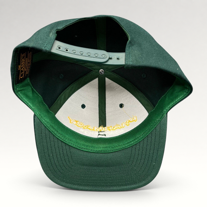 Raree Finds vintage forest green Yupoong Classics snapback hat showing interior construction and plastic strap