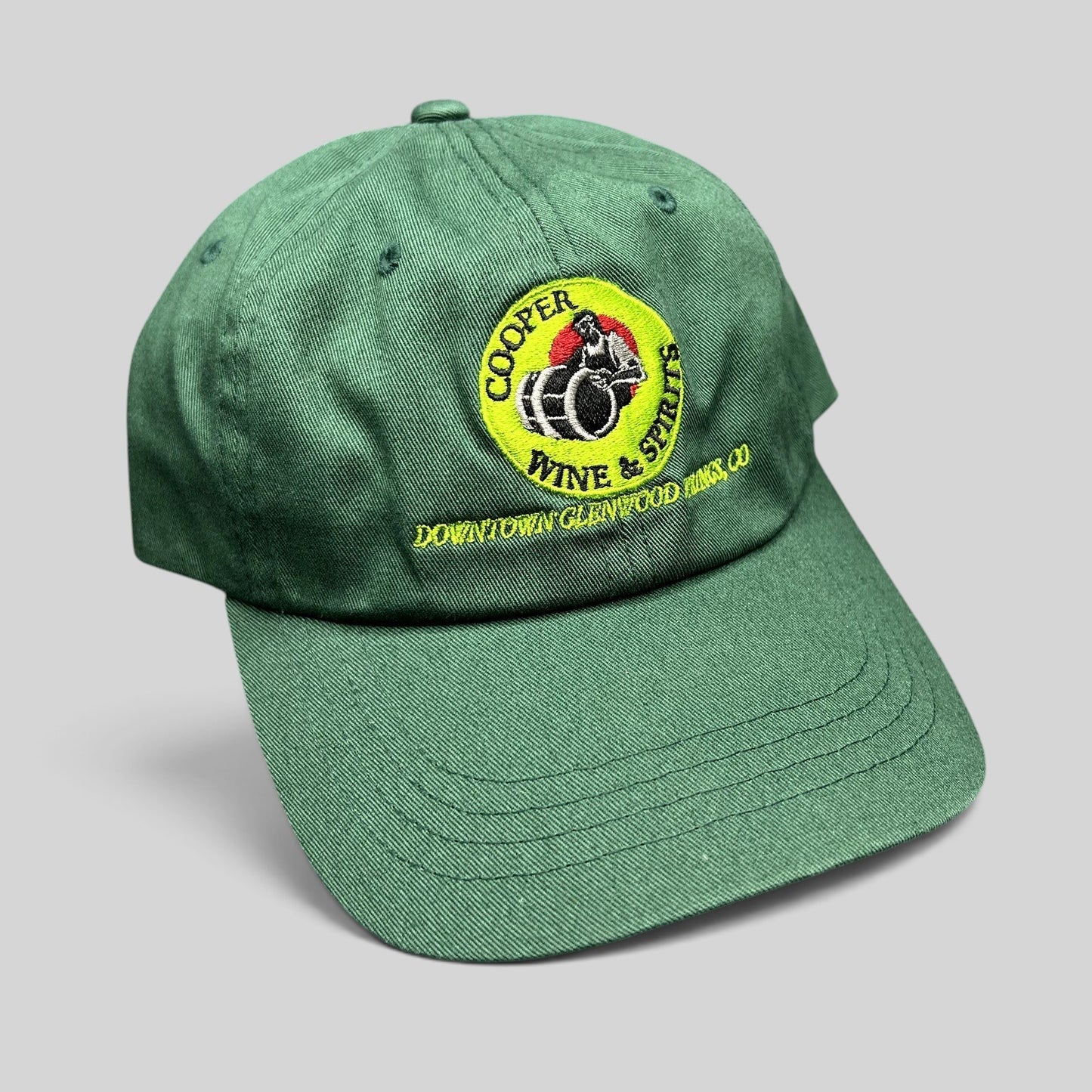 Raree Finds forest green cotton strapback hat with vintage Cooper Wine & Spirits logo embroidery