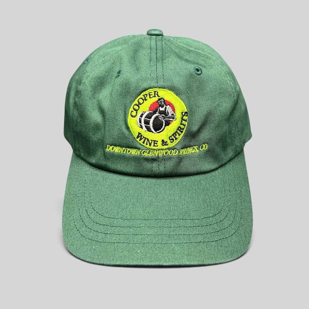 Raree Finds forest green cotton strapback hat with vintage Cooper Wine & Spirits logo embroidery from Glenwood Springs
