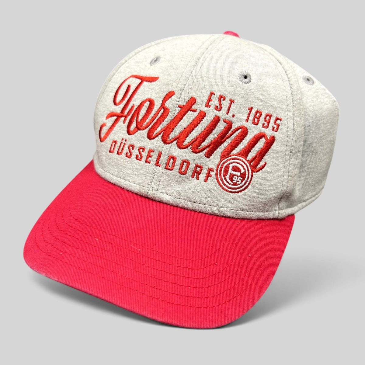 Raree Finds Fortuna Düsseldorf soccer strapback hat with a heather gray crown, red brim, and red embroidered logo.