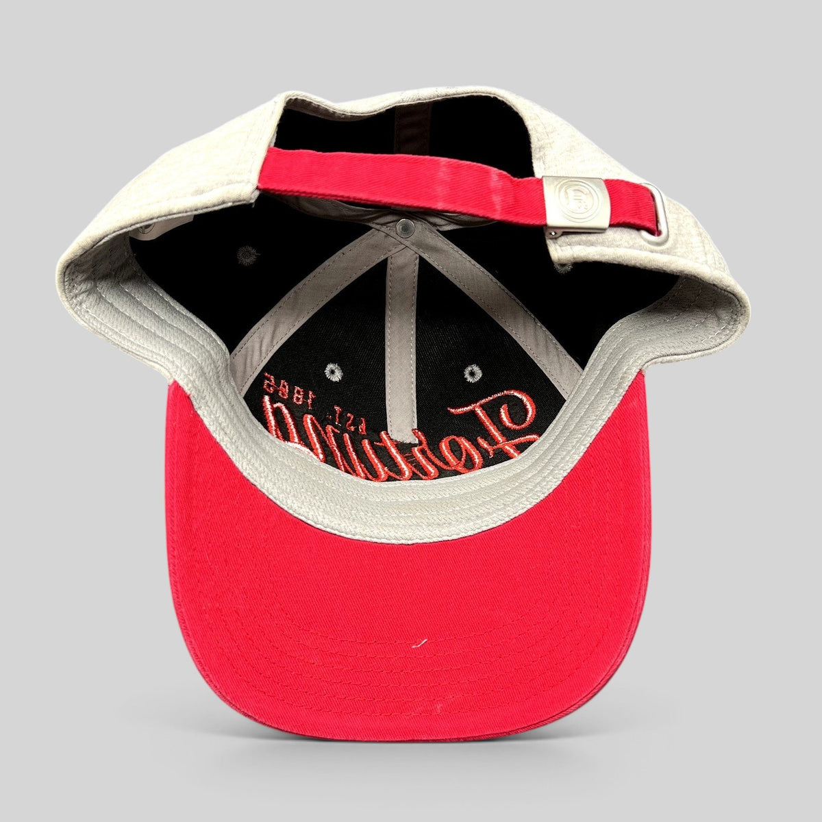 Raree Finds Fortuna Düsseldorf soccer strapback hat featuring a heather gray crown, red brim, and adjustable strap.