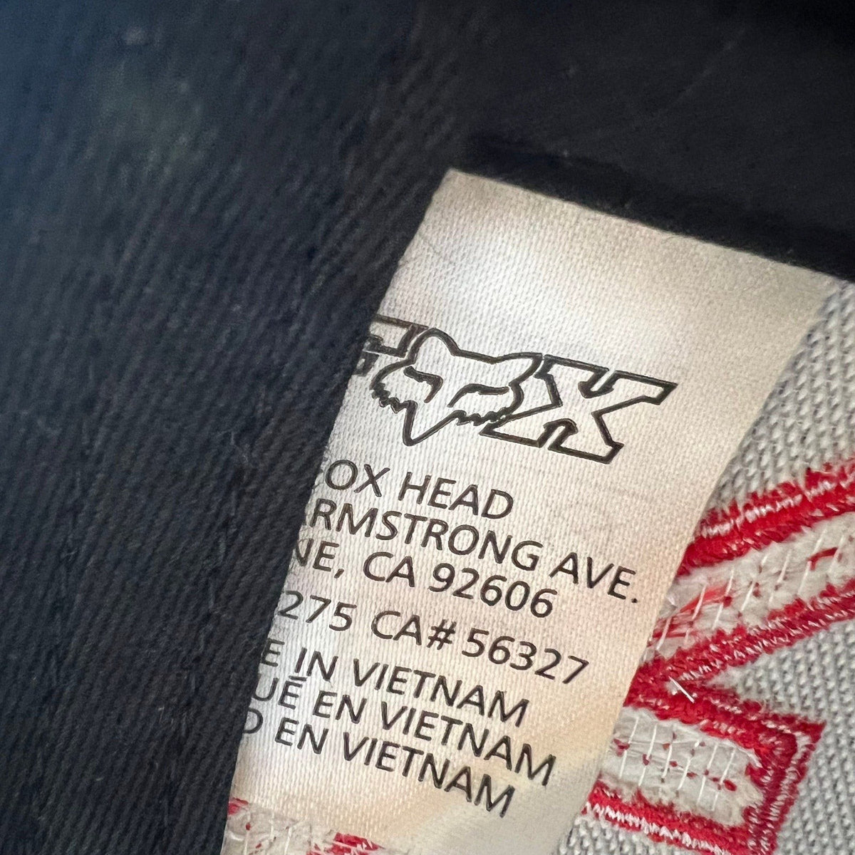 Raree Finds Fox Racing snapback hat interior care label showing brand logo and manufacturing details