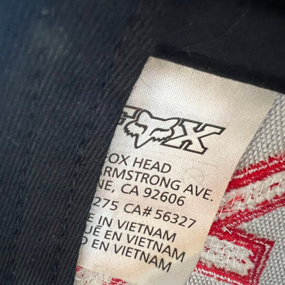 Raree Finds Fox Racing snapback hat interior care label showing brand logo and manufacturing details