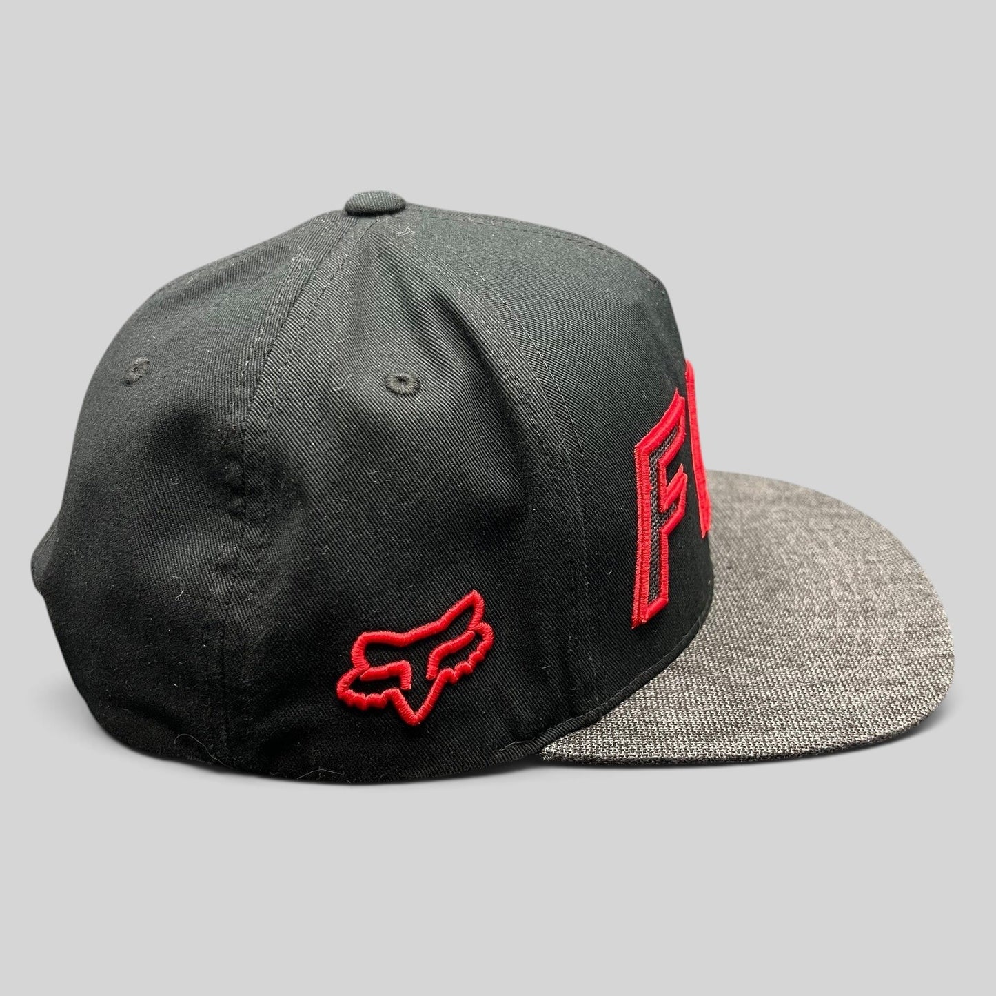 Raree Finds Fox Racing black snapback hat with red embroidered logo and heather gray flat bill