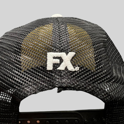 Raree Finds black mesh trucker hat back view with white embroidered FX logo and adjustable snapback closure