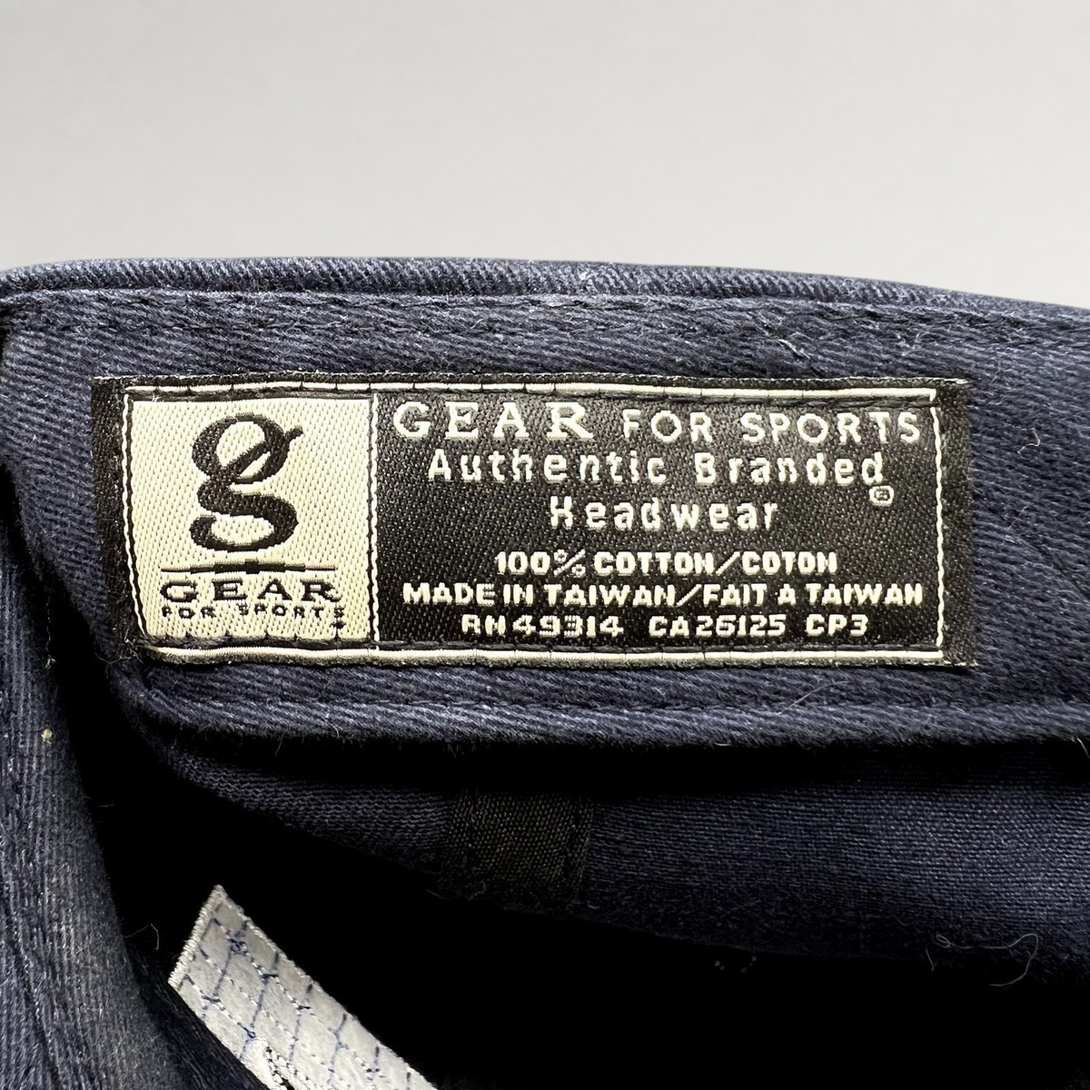 Raree Finds vintage Gear For Sports navy cotton hat interior label showing manufacturing details and origin