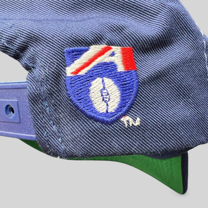 Raree Finds vintage Geelong AFL snapback hat featuring embroidered team logo detail on the navy blue side panel