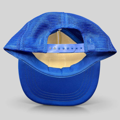 Raree Finds vintage Germany trucker hat showing the blue mesh back, adjustable snapback closure, and blue bill.