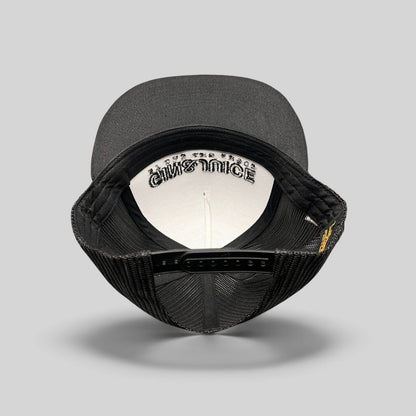 Raree Finds Gin & Juice black snapback hat showing the interior crown with branded embroidery and adjustable strap
