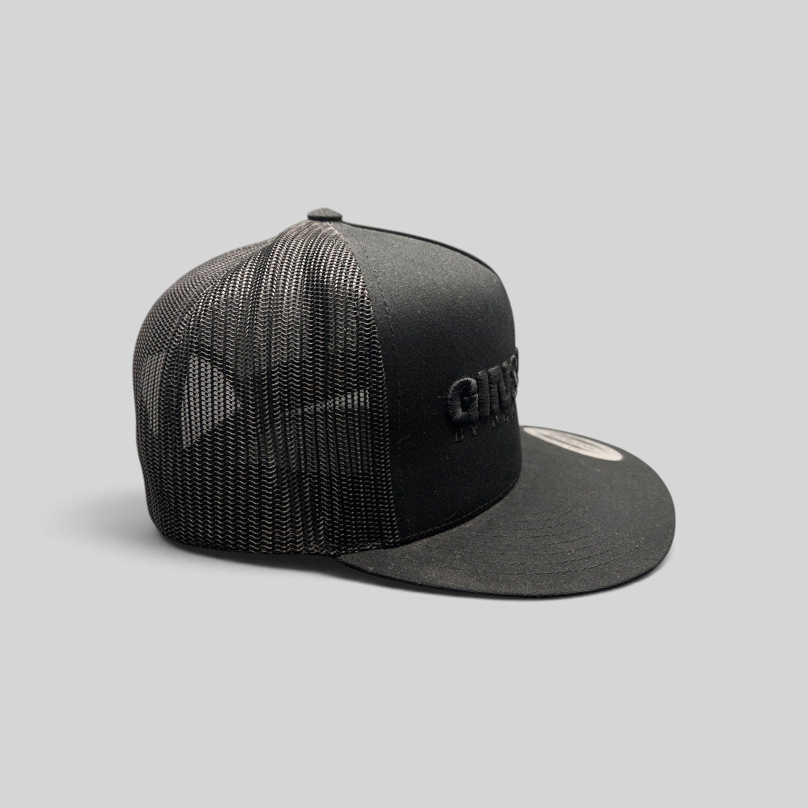 Raree Finds black Gin & Juice snapback hat with puff embroidery and mesh back panels on a flat brim cap.