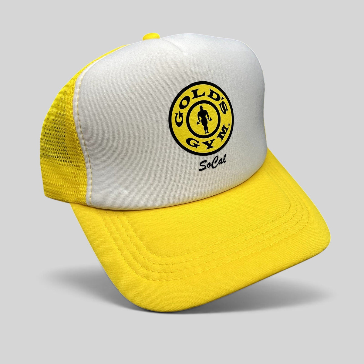 Raree Finds Gold’s Gym SoCal trucker hat in yellow and white with a breathable mesh back and adjustable snapback.
