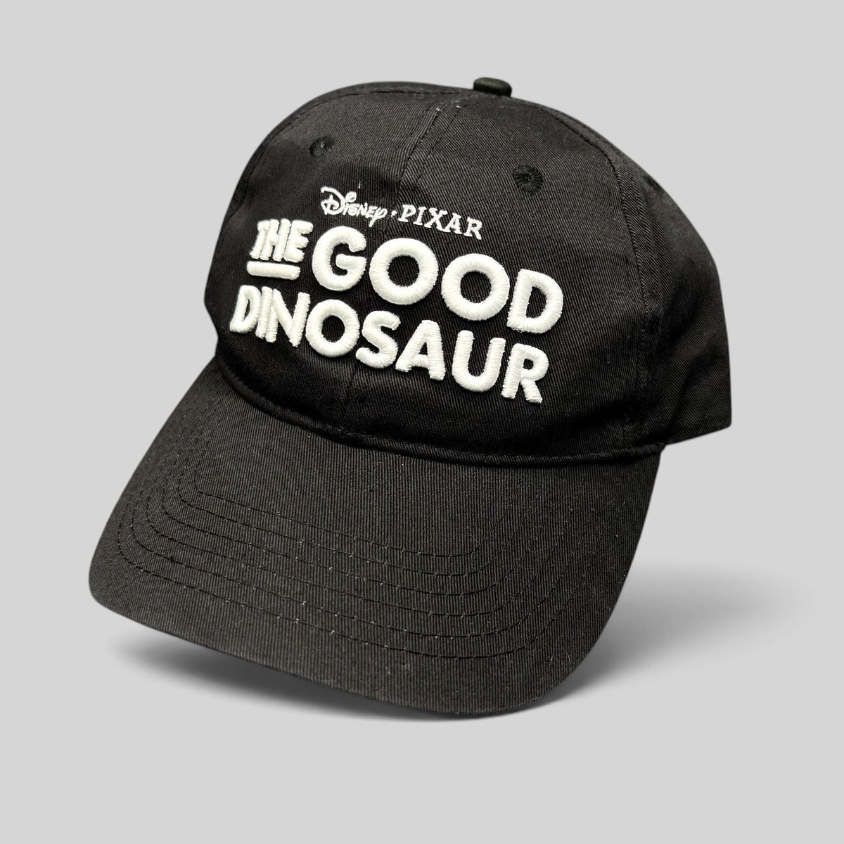 Raree Finds black Disney Pixar The Good Dinosaur promotional strapback hat with white embroidered movie logo