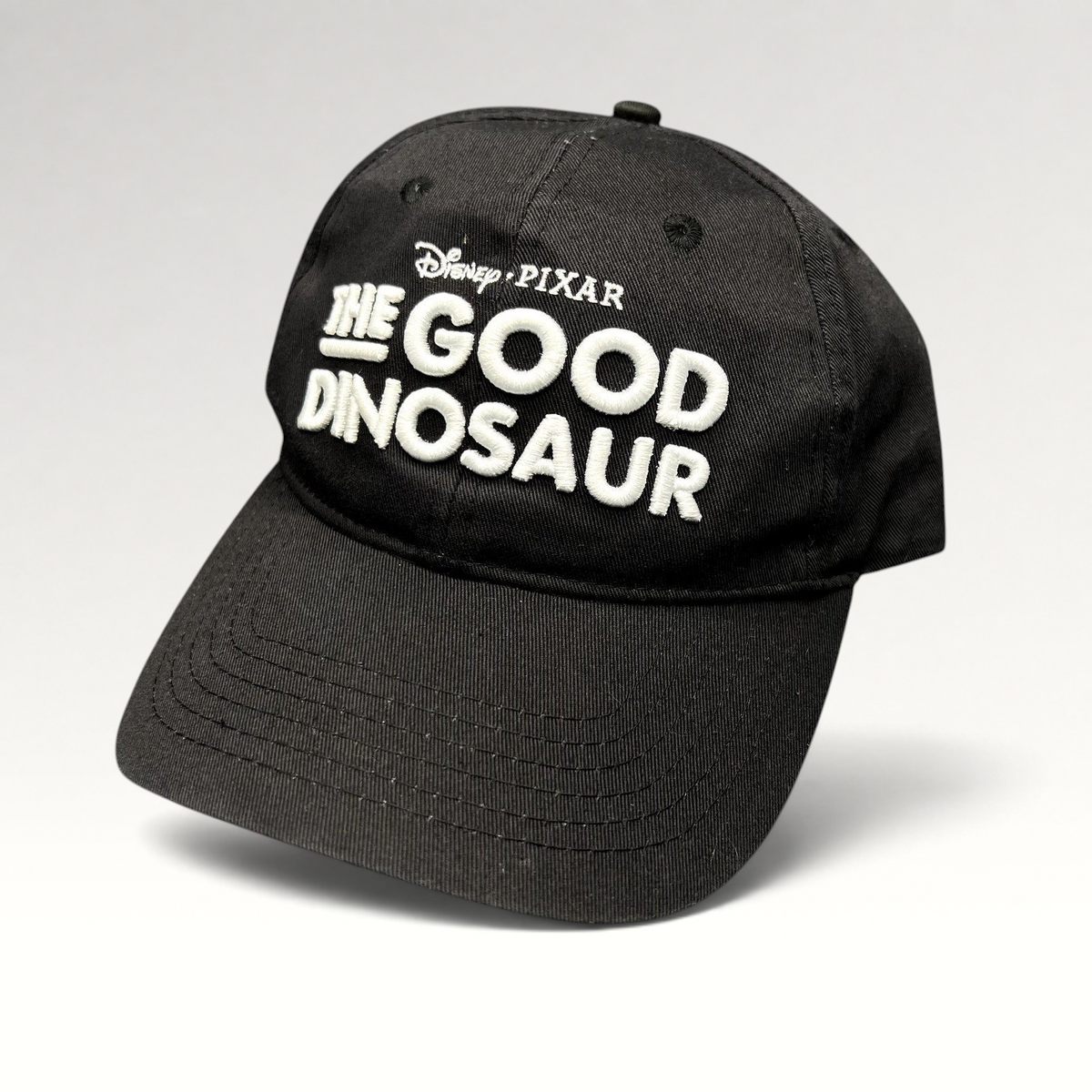 Raree Finds black Disney Pixar The Good Dinosaur promotional strapback hat with white embroidered movie logo