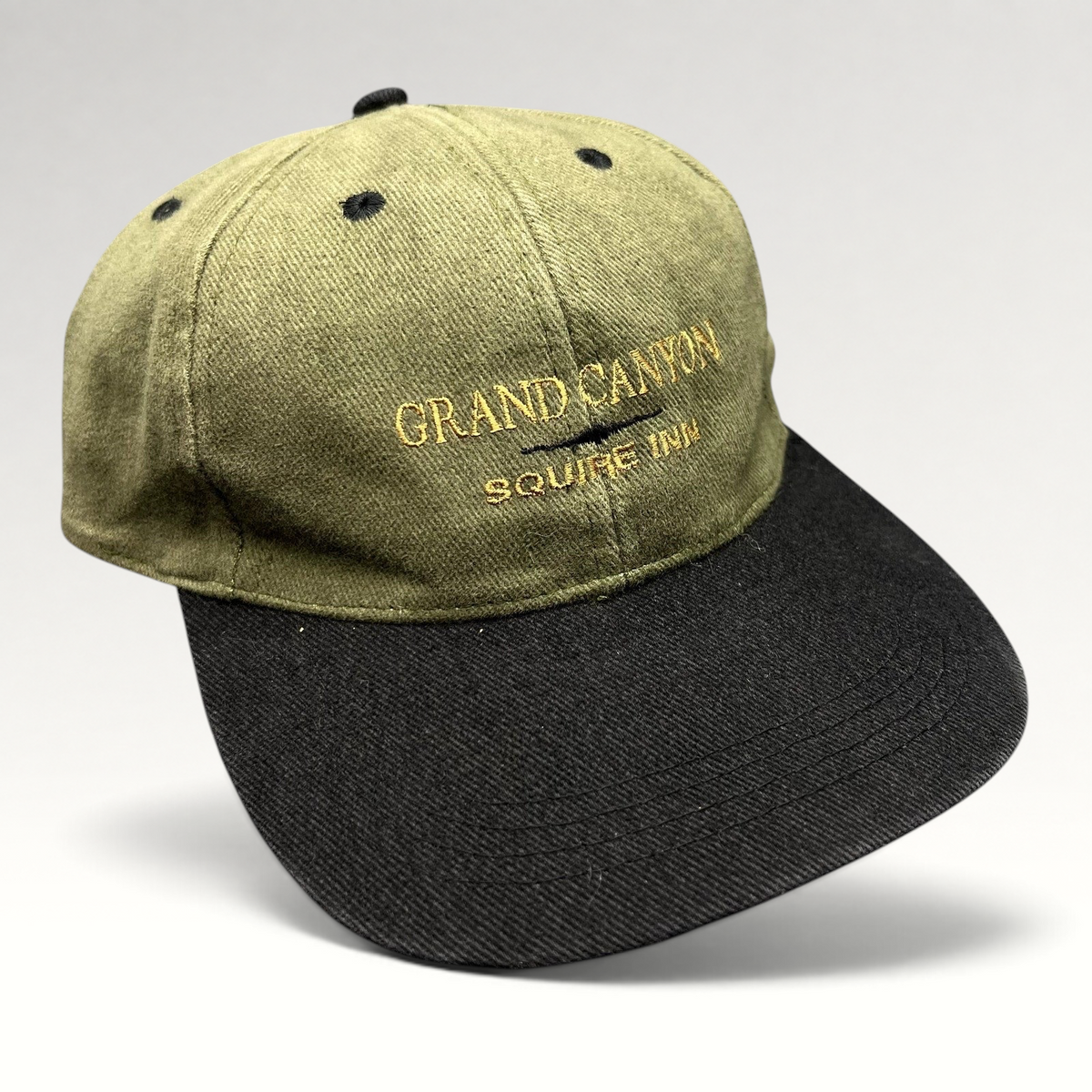 Raree Finds vintage olive green and black cotton strapback hat with Grand Canyon Squire Inn embroidery