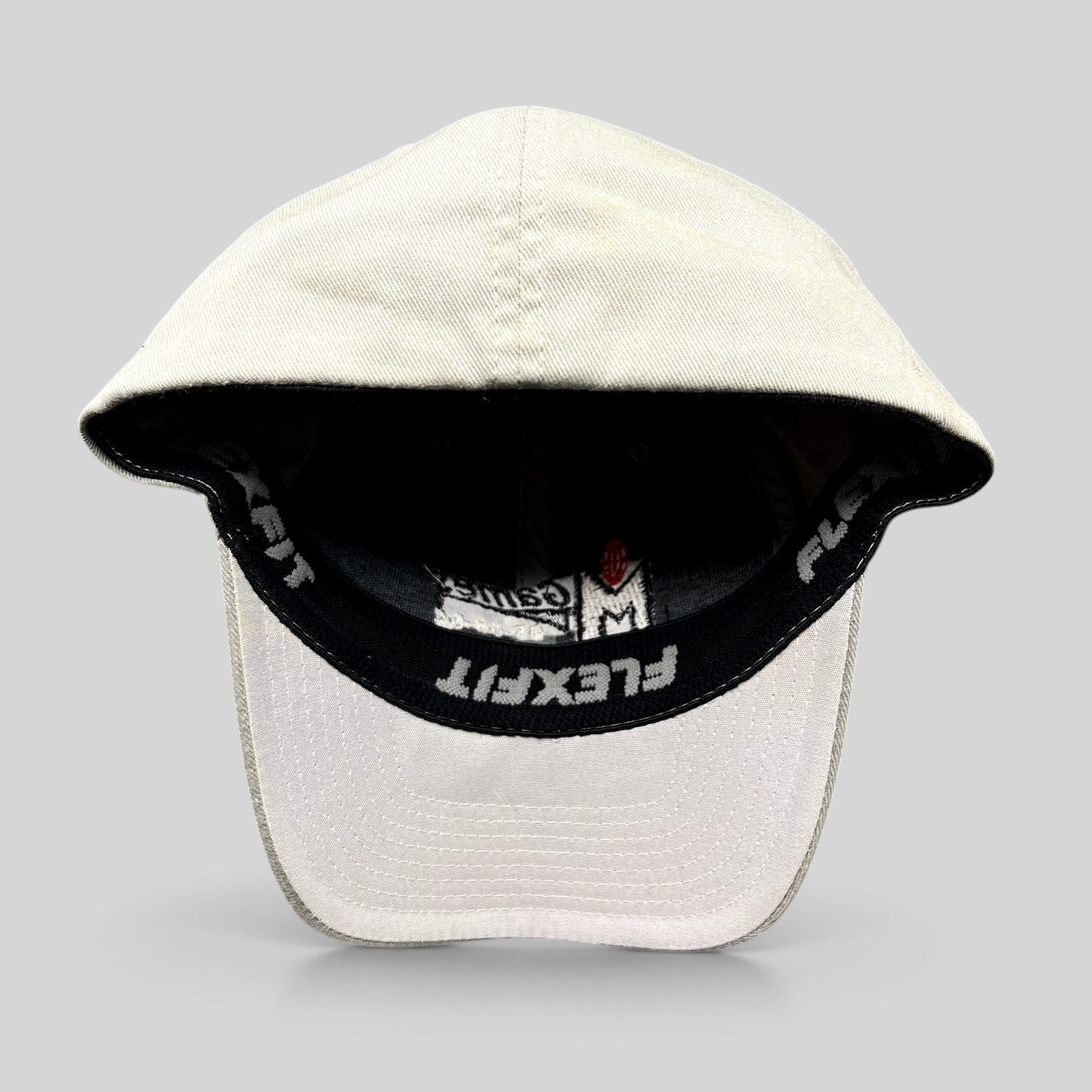 Raree Finds gray Yupoong Flexfit M Games 2004 event baseball cap with embroidered logo and interior sweatband detail