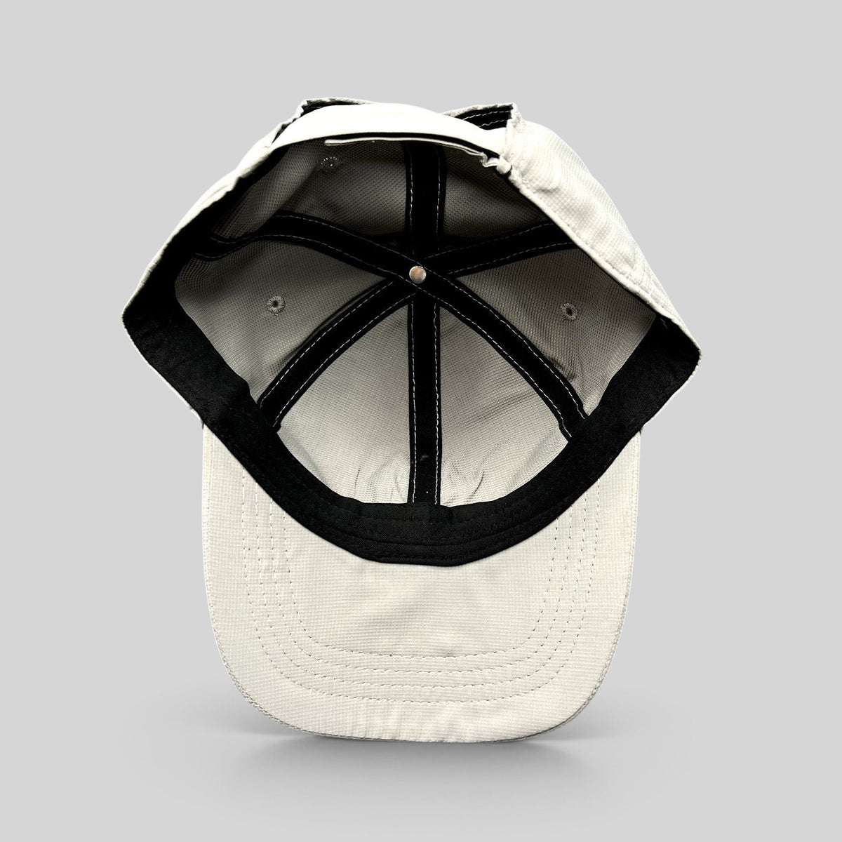 Raree Finds gray performance fabric golf cap interior view showing construction and adjustable strapback closure