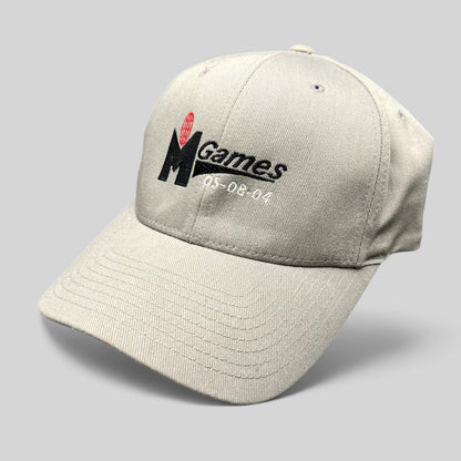 Raree Finds gray Yupoong Flexfit baseball cap with M Games 2004 event embroidery in black and red on a black background