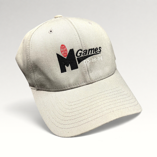 Raree Finds gray Yupoong Flexfit baseball cap with embroidered M Games 2004 event logo in black and red