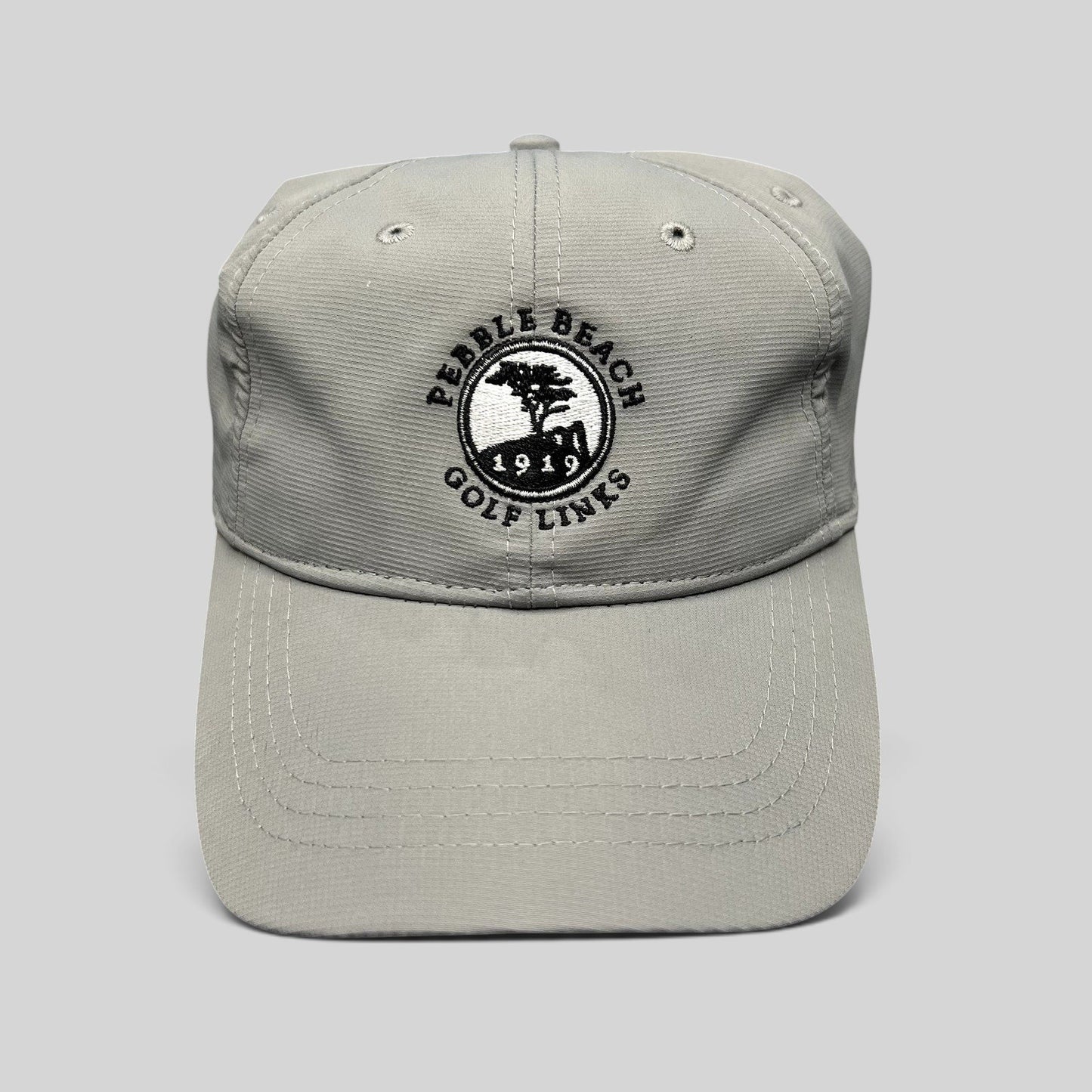 Raree Finds gray performance fabric golf cap with embroidered Pebble Beach Golf Links 1919 logo and strapback closure