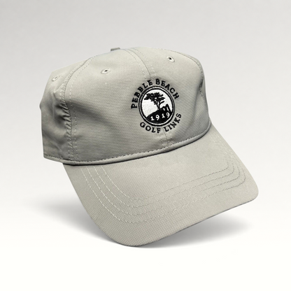 Raree Finds gray performance fabric golf cap with embroidered Pebble Beach Golf Links 1919 logo and strapback closure.
