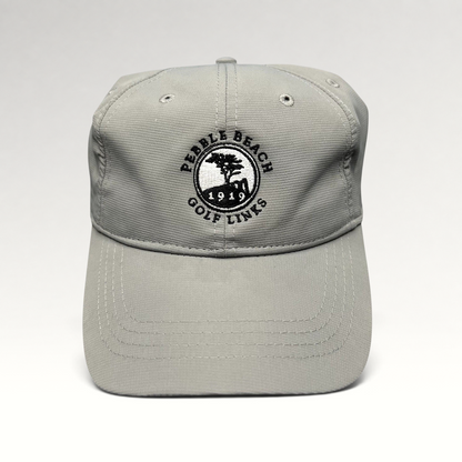 Raree Finds gray performance fabric golf cap with embroidered Pebble Beach Golf Links 1919 logo and strapback closure.