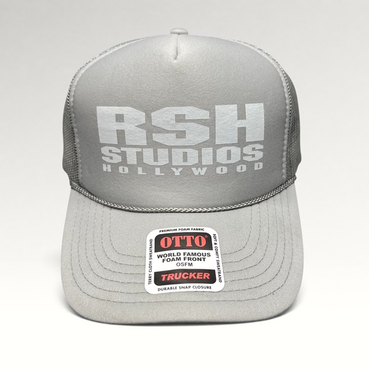 Raree Finds RSH Studios Hollywood gray trucker hat with white tonal print, mesh back, and braided brim rope detail.