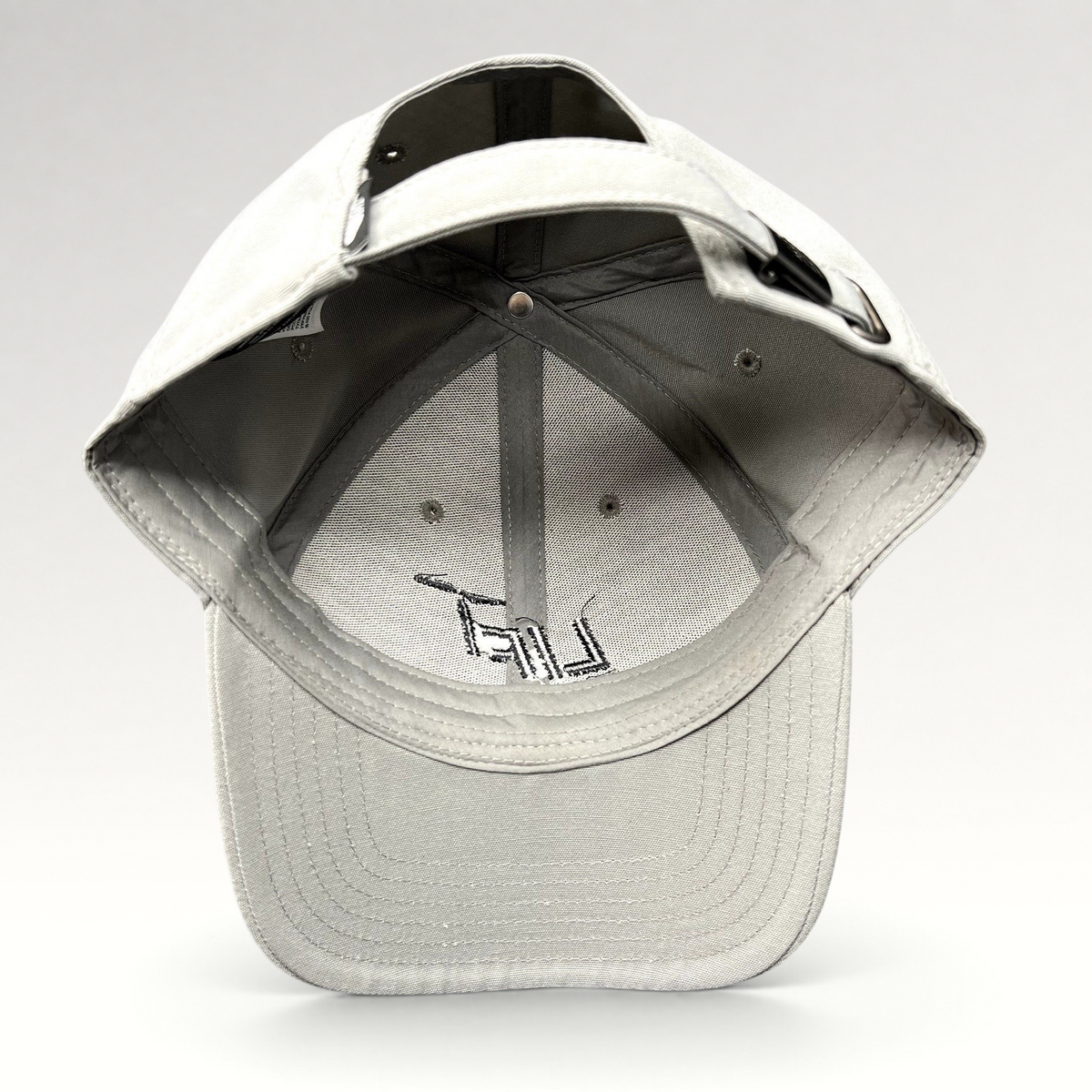 Raree Finds gray The North Face strapback hat with Lift Aircraft embroidery, showing interior six-panel construction.