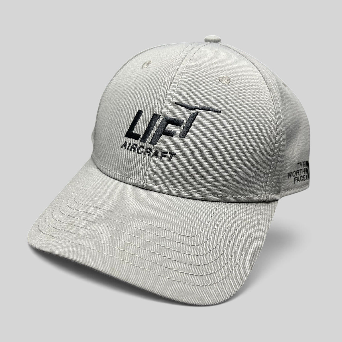 Raree Finds gray The North Face strapback hat with black Lift Aircraft embroidery on a structured six-panel cap.