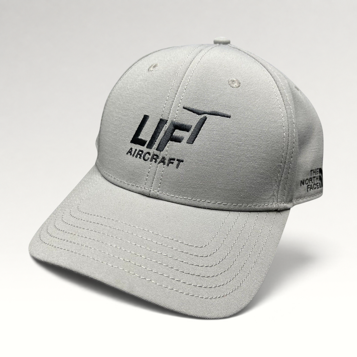 Raree Finds gray The North Face strapback hat with black Lift Aircraft embroidery on a structured six-panel cap.