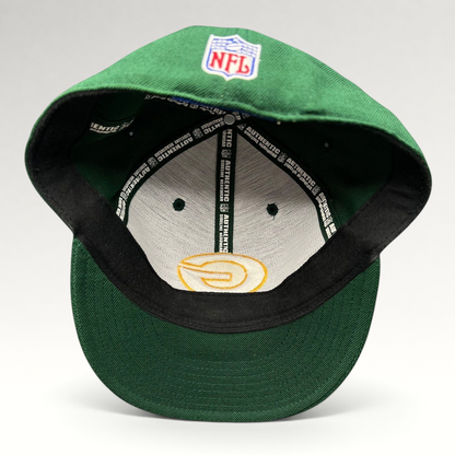 Raree Finds vintage Reebok Green Bay Packers on-field fitted hat showing interior branding and NFL logo embroidery.