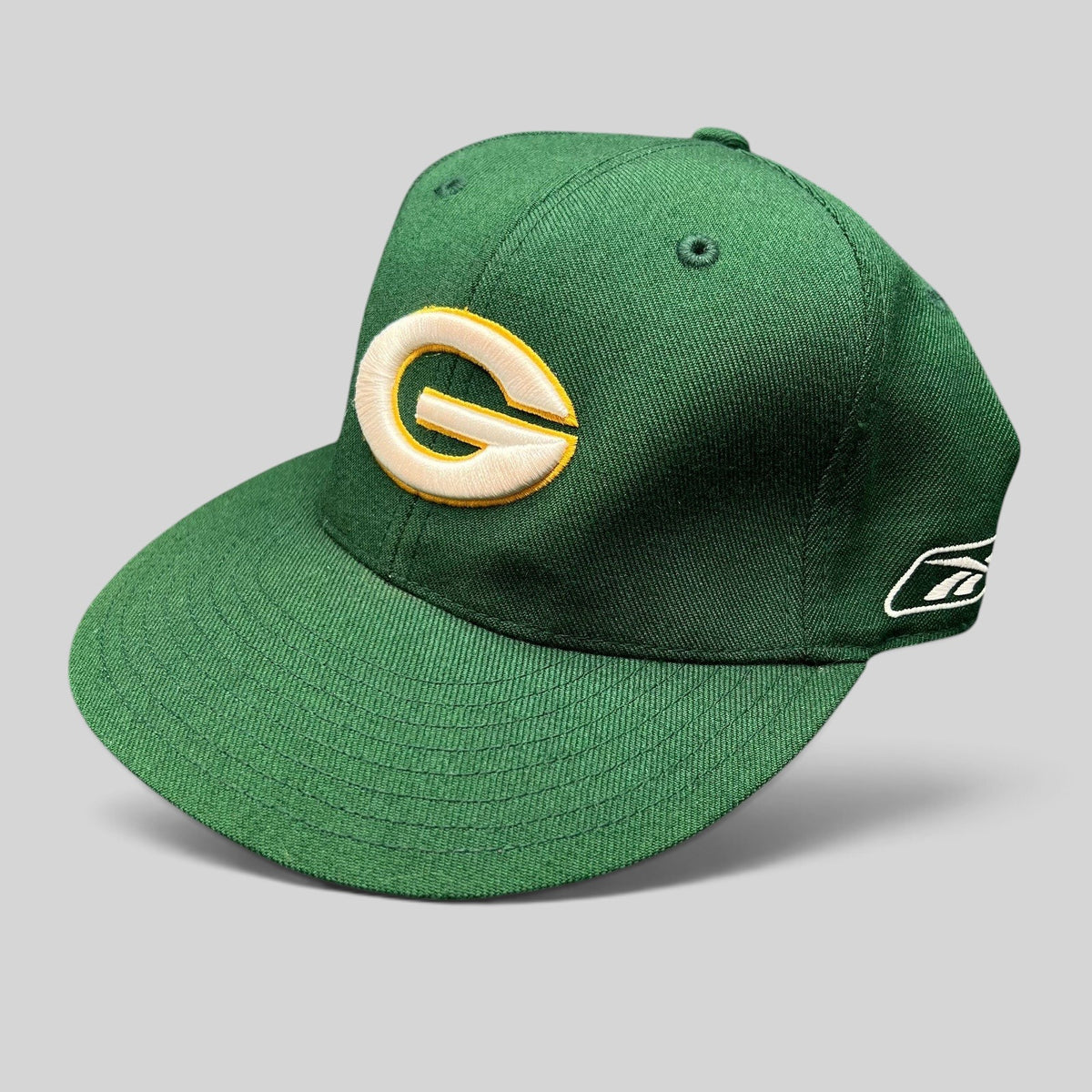 Raree Finds vintage Reebok Green Bay Packers fitted hat in green with embroidered gold and white G logo