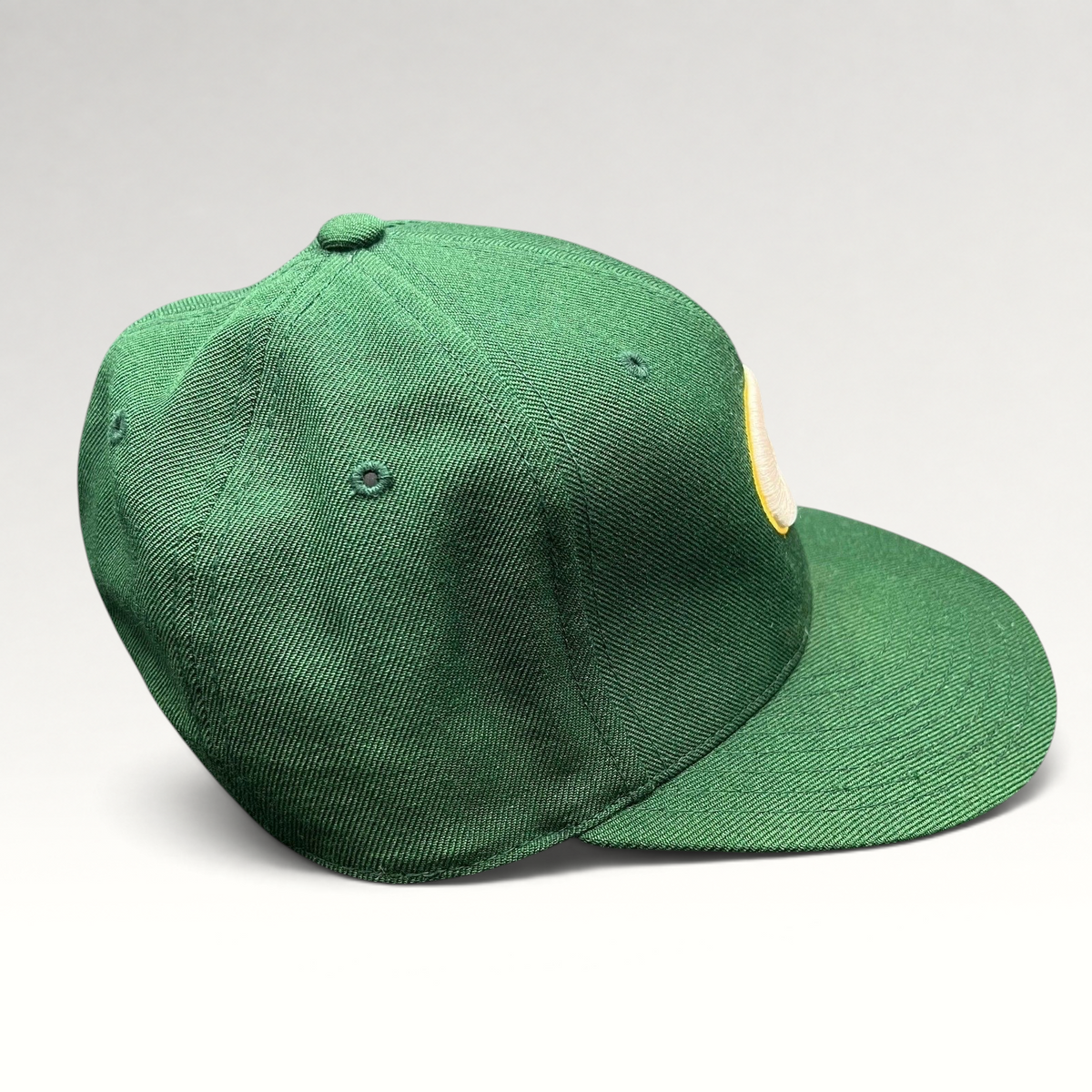 Raree Finds vintage Reebok Green Bay Packers fitted hat in green with embroidered team logo and structured crown