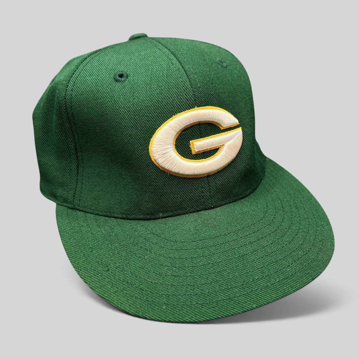 Raree Finds vintage Green Bay Packers Reebok fitted hat in green with embroidered yellow and white G logo