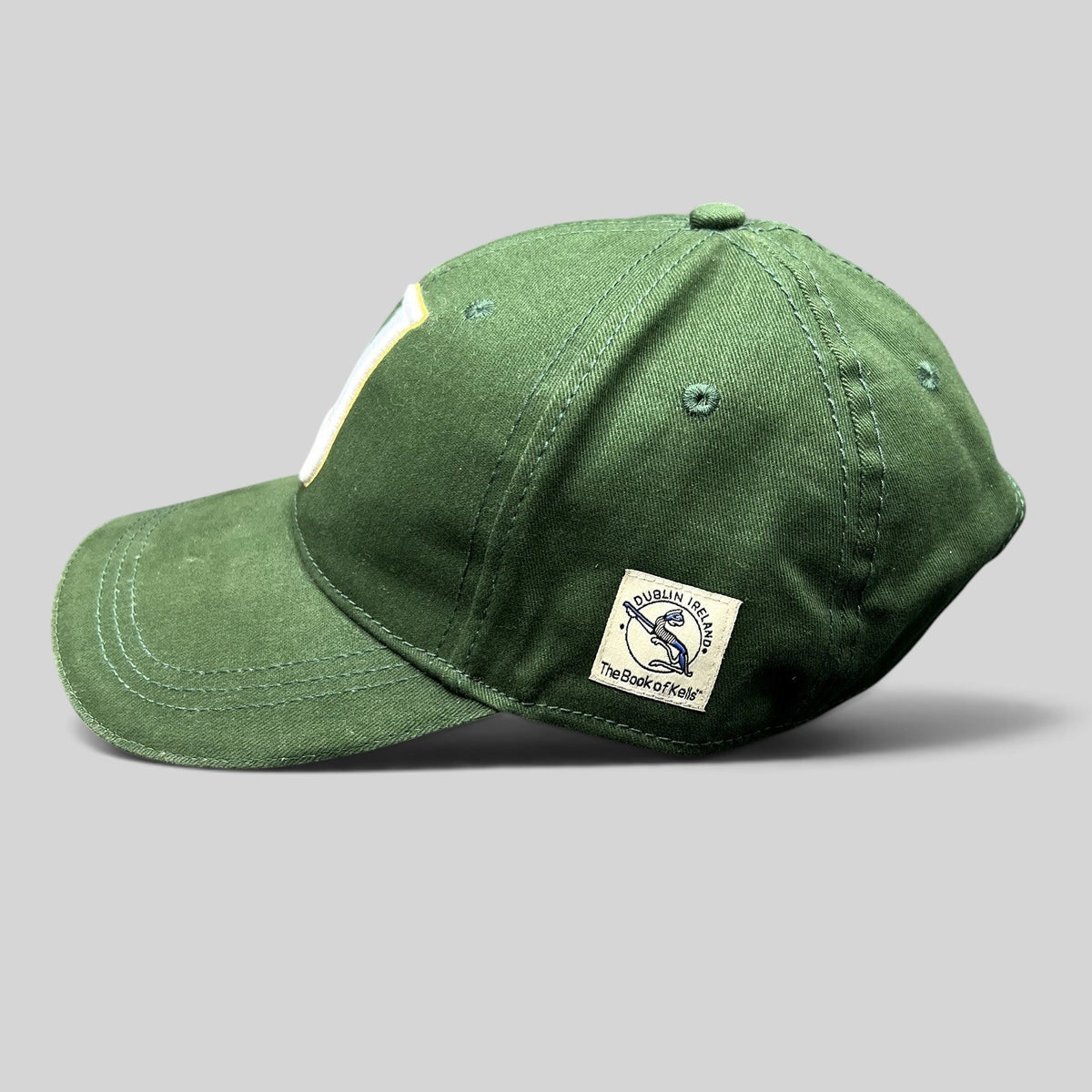 Raree Finds dark green Book of Kells strapback hat with side patch featuring Dublin Ireland Celtic knot embroidery