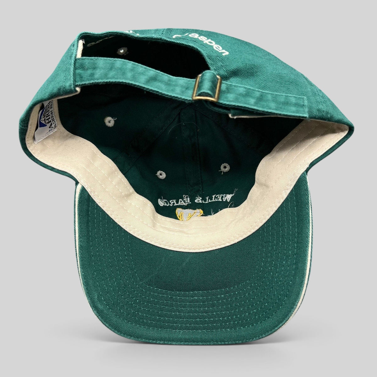 Raree Finds vintage green cotton strapback golf hat with adjustable brass buckle and interior branding details
