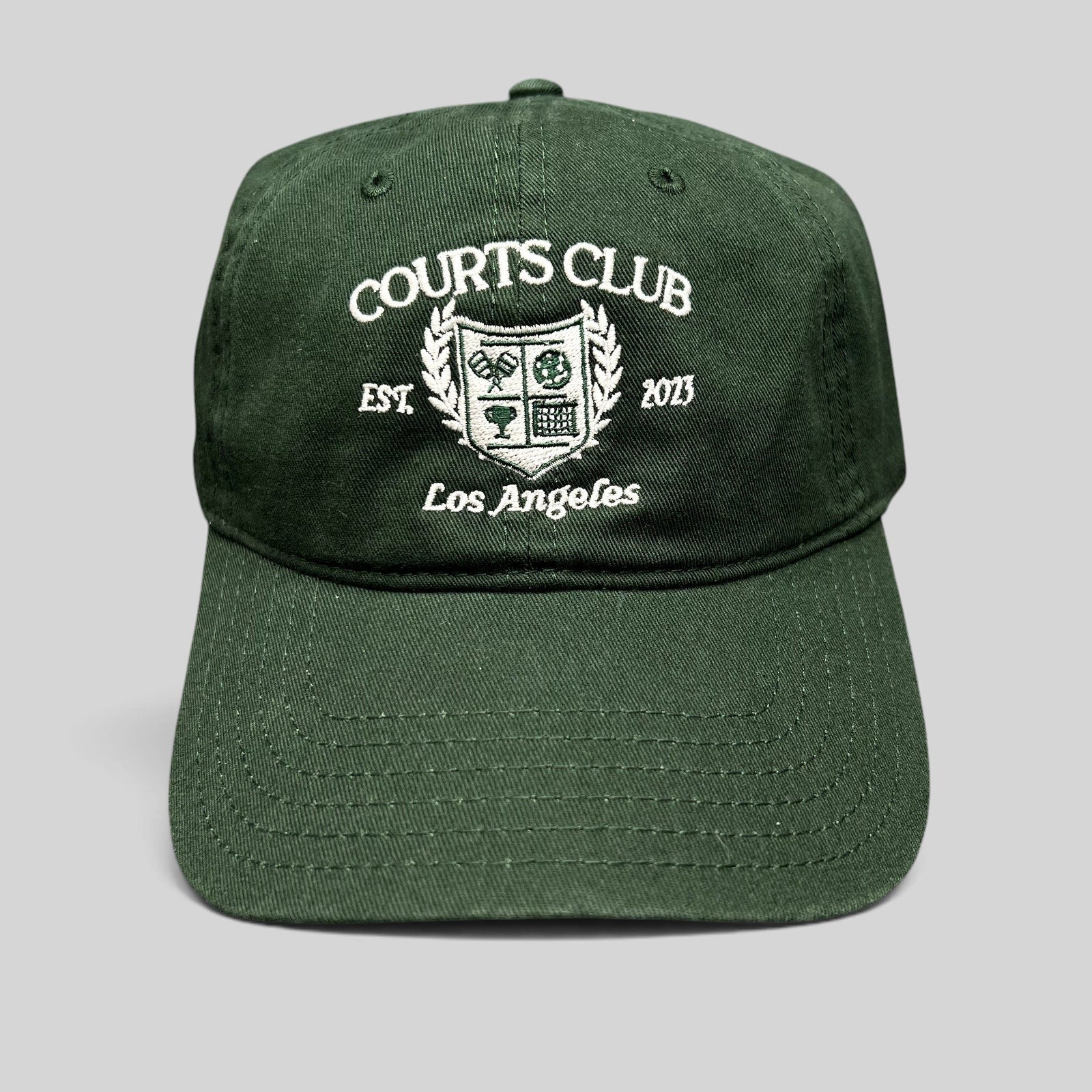 Raree Finds dark green Courts Club Los Angeles cotton strapback hat with white embroidered tennis crest logo