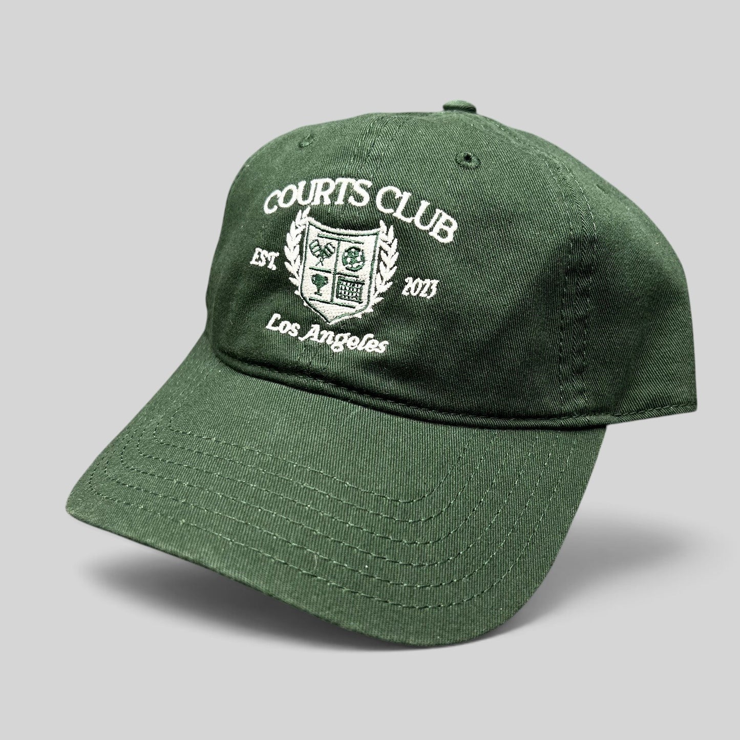 Raree Finds dark green Courts Club Los Angeles cotton strapback hat with white embroidered tennis crest logo