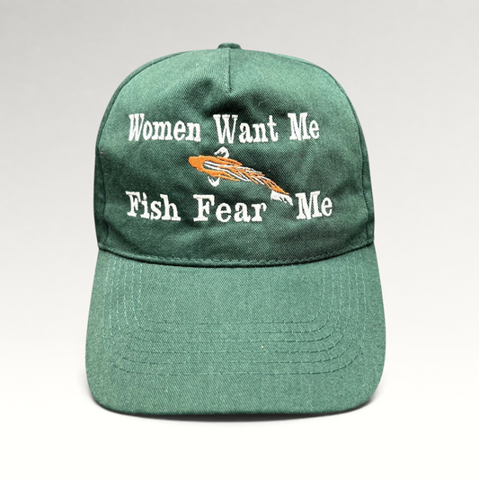 Raree Finds forest green dad cap with embroidered Women Want Me Fish Fear Me slogan and orange fishing lure graphic.