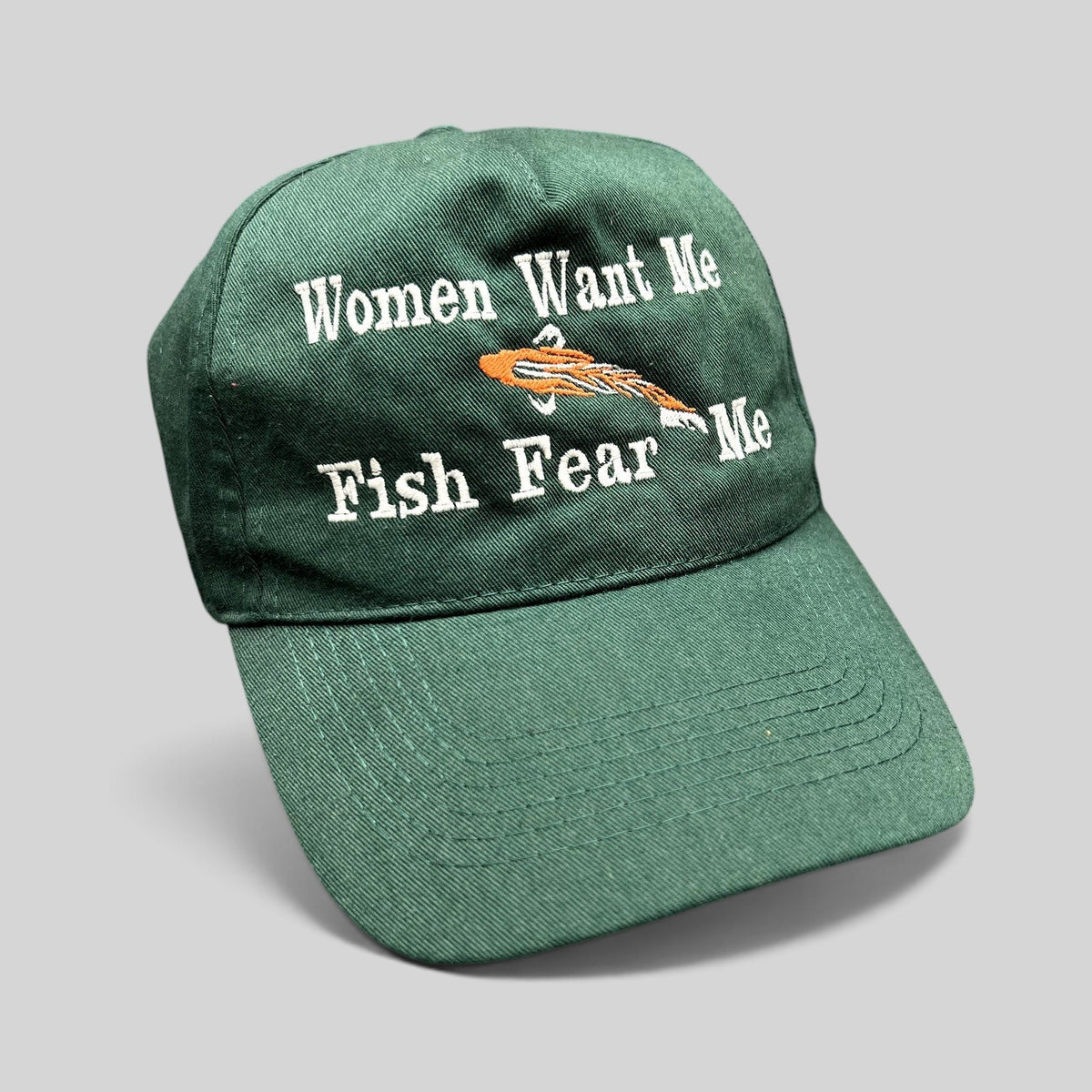 Raree Finds forest green dad cap with white embroidered Women Want Me Fish Fear Me slogan and orange fishing lure