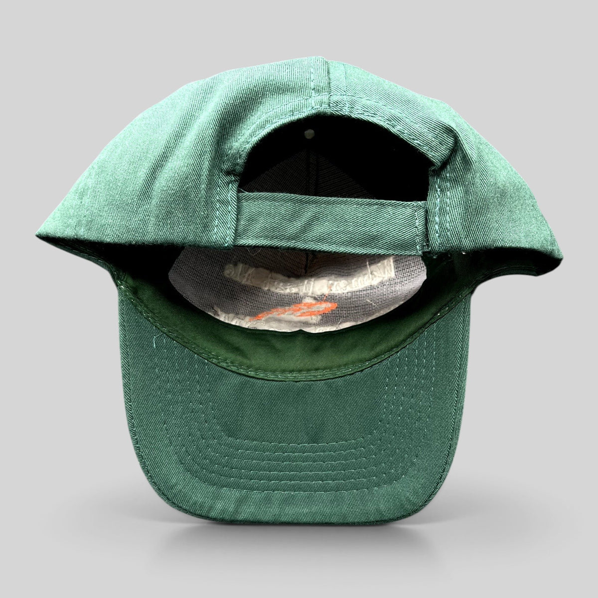 Raree Finds forest green fishing dad cap with adjustable strapback and embroidered slogan on the interior brim