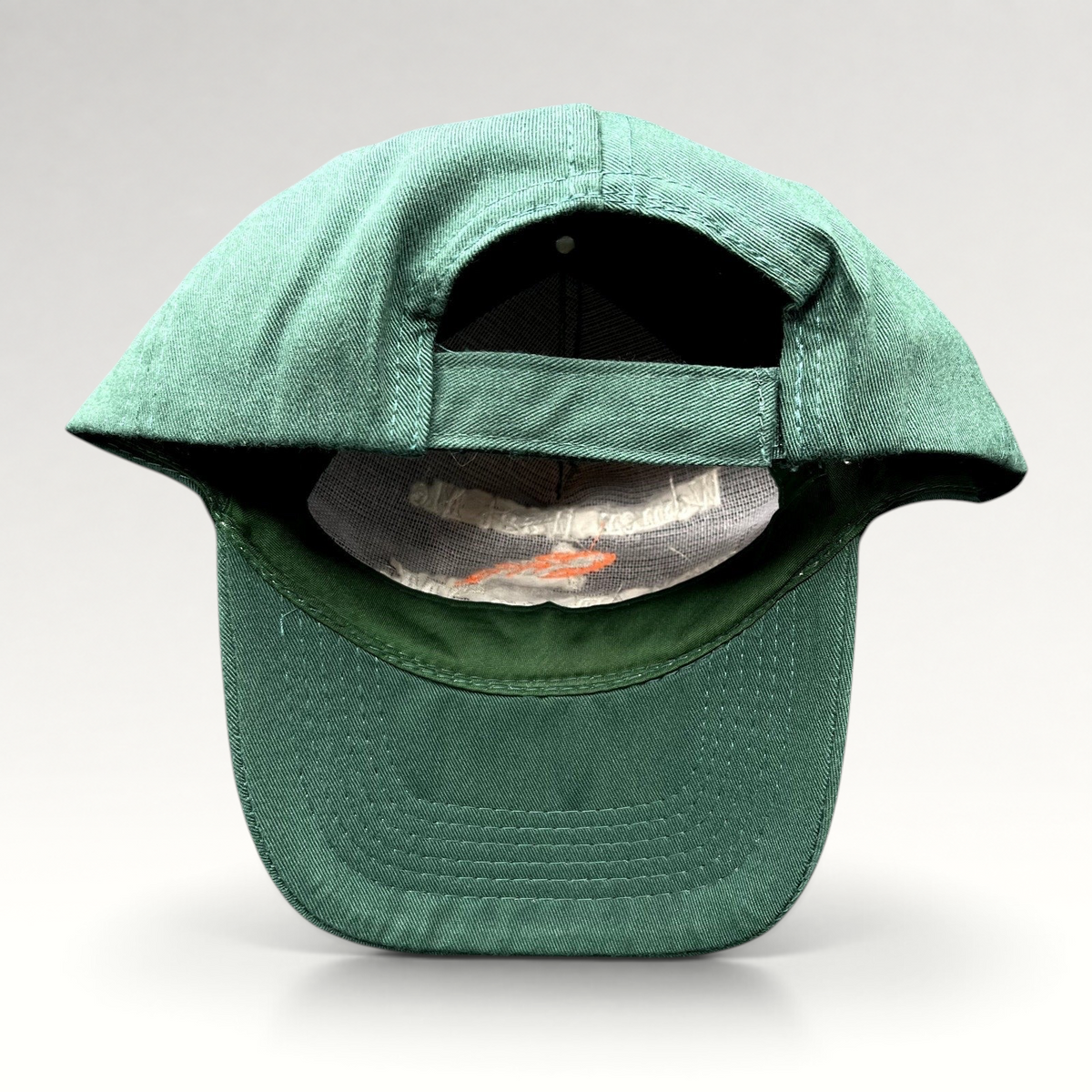 Raree Finds forest green fishing dad cap with adjustable strapback and curved brim, viewed from the back