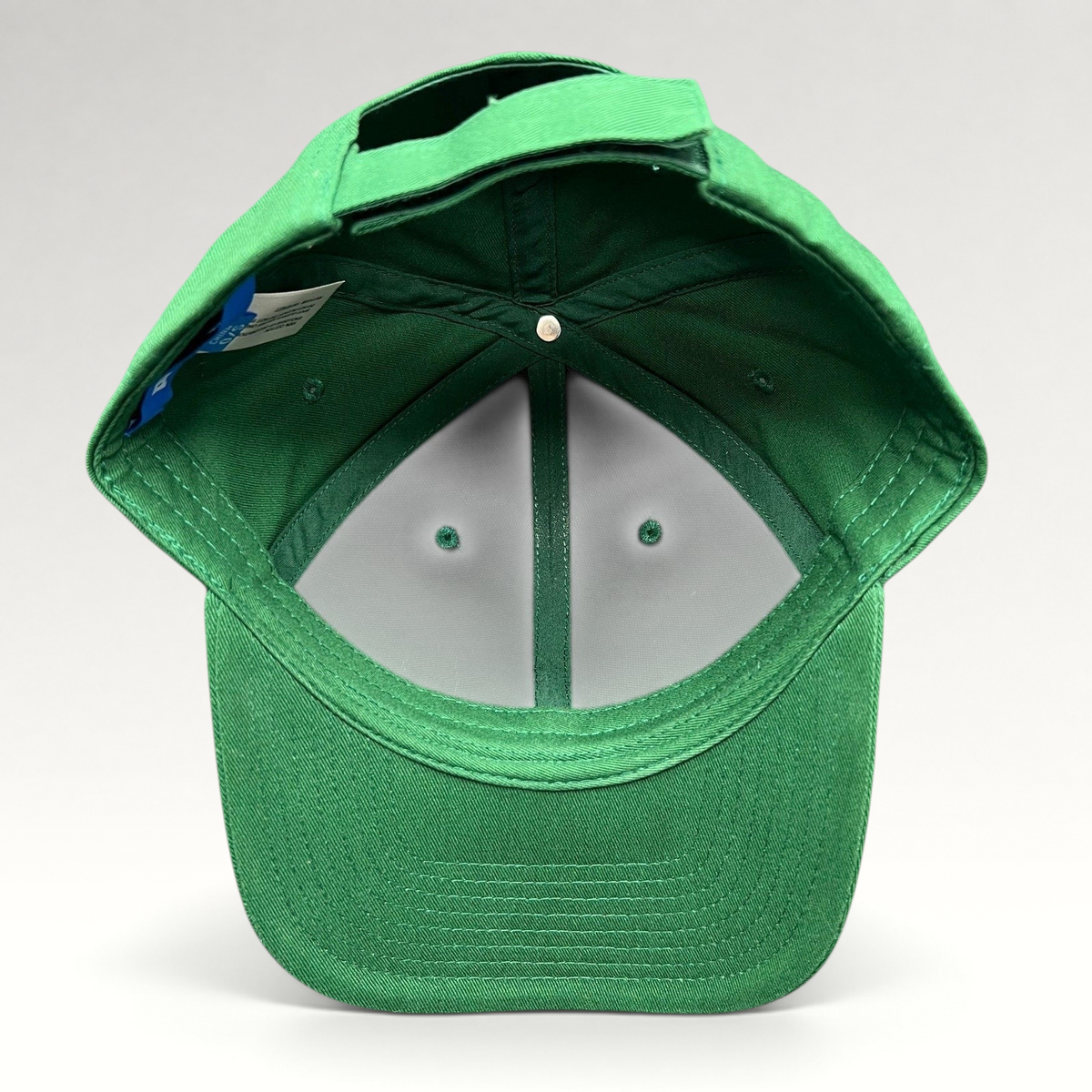Raree Finds Prince Pickleball green strapback hat showing the interior construction and adjustable back strap