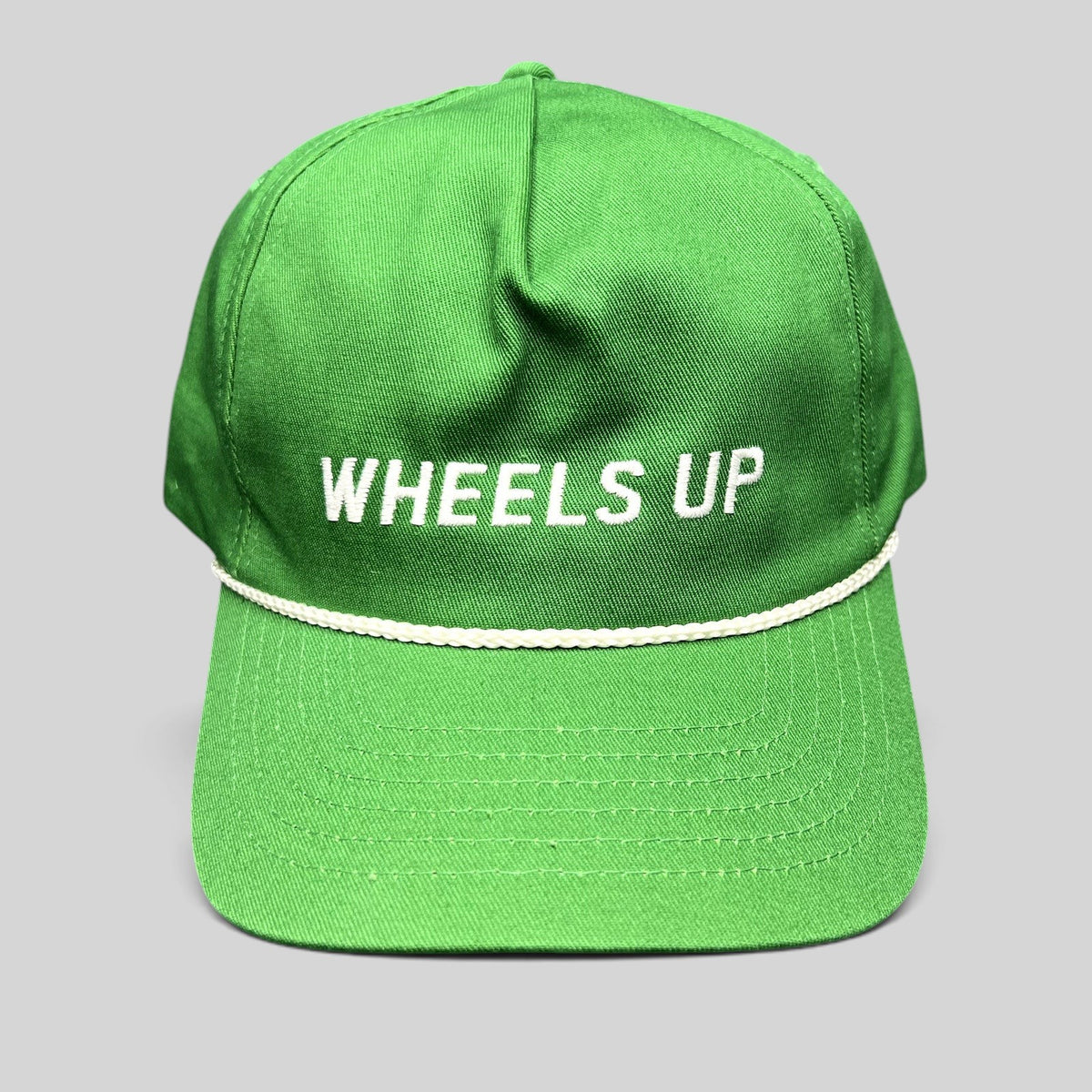 Raree Finds green cotton strapback hat with white WHEELS UP embroidery and a classic white rope detail on the brim.