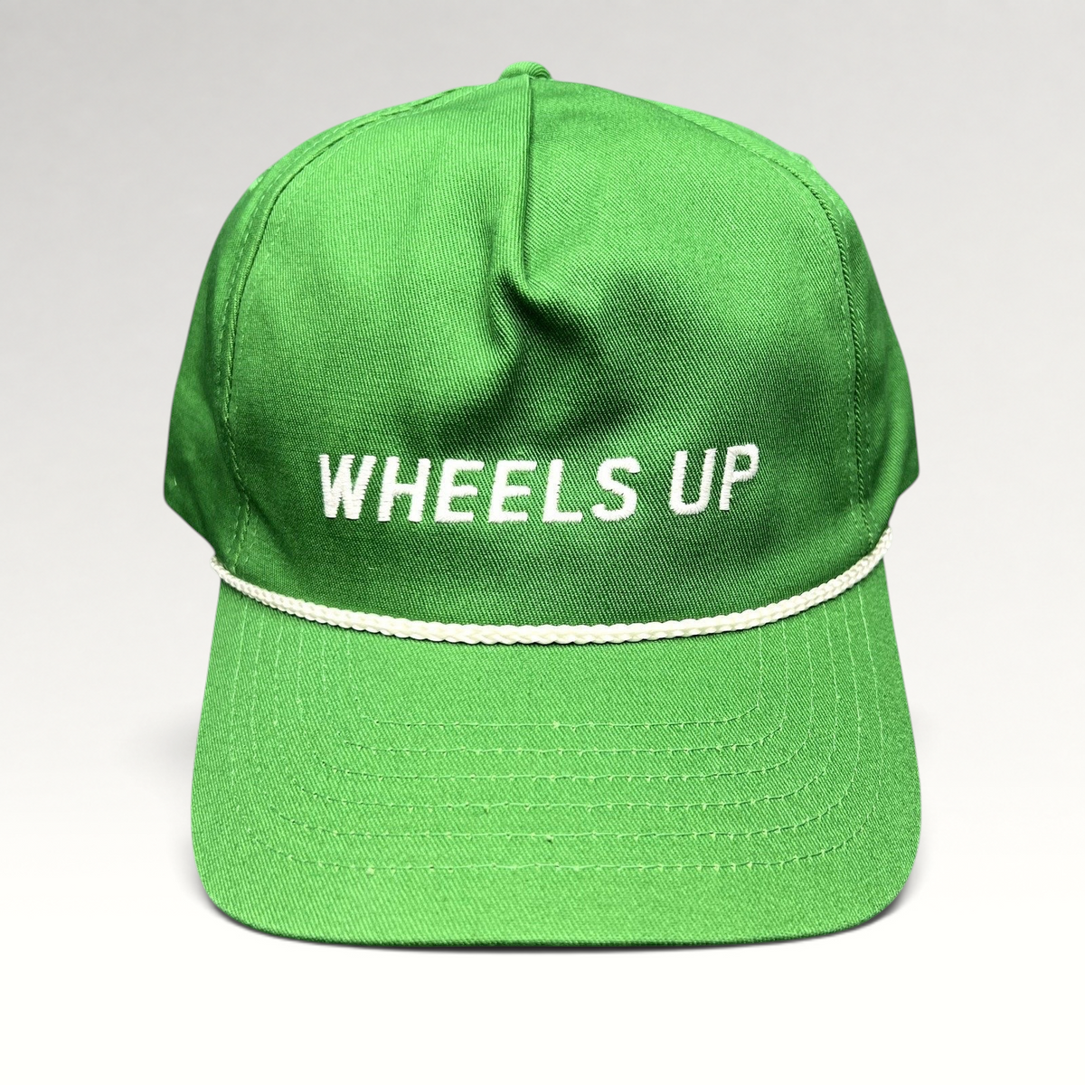 Raree Finds green cotton strapback hat with white WHEELS UP embroidery and a classic white rope detail on the brim.
