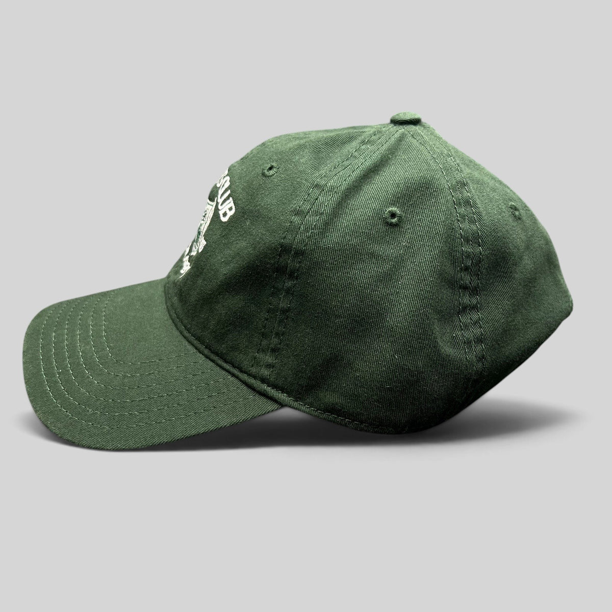 Raree Finds dark green cotton strapback hat with white embroidered tennis club crest logo, side profile view.