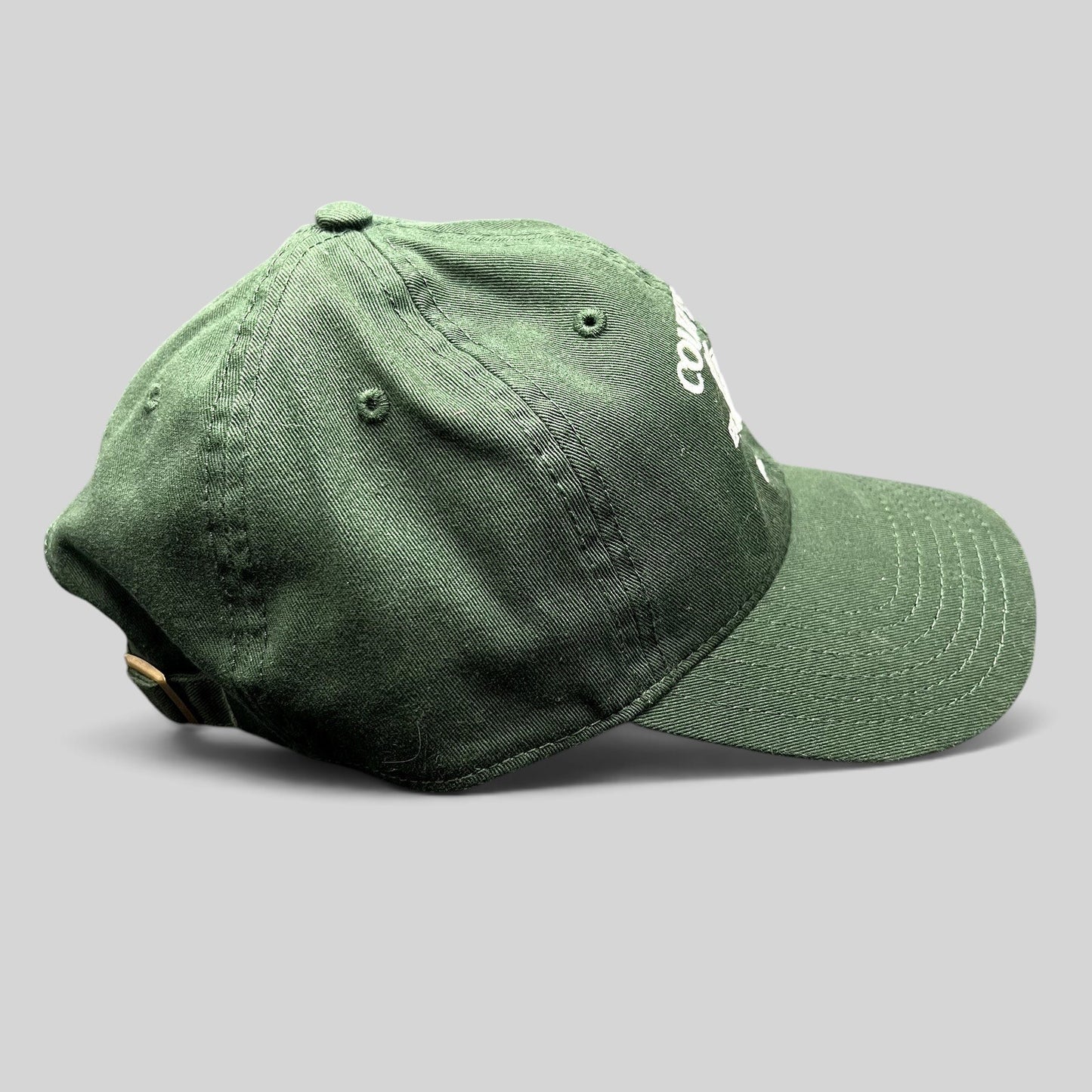 Raree Finds dark green cotton strapback hat with white embroidered tennis club crest logo and adjustable back strap.