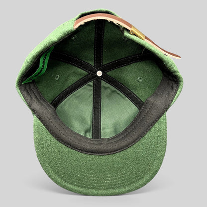 Raree Finds forest green wool-style strapback hat interior view with leather strap and brass hardware