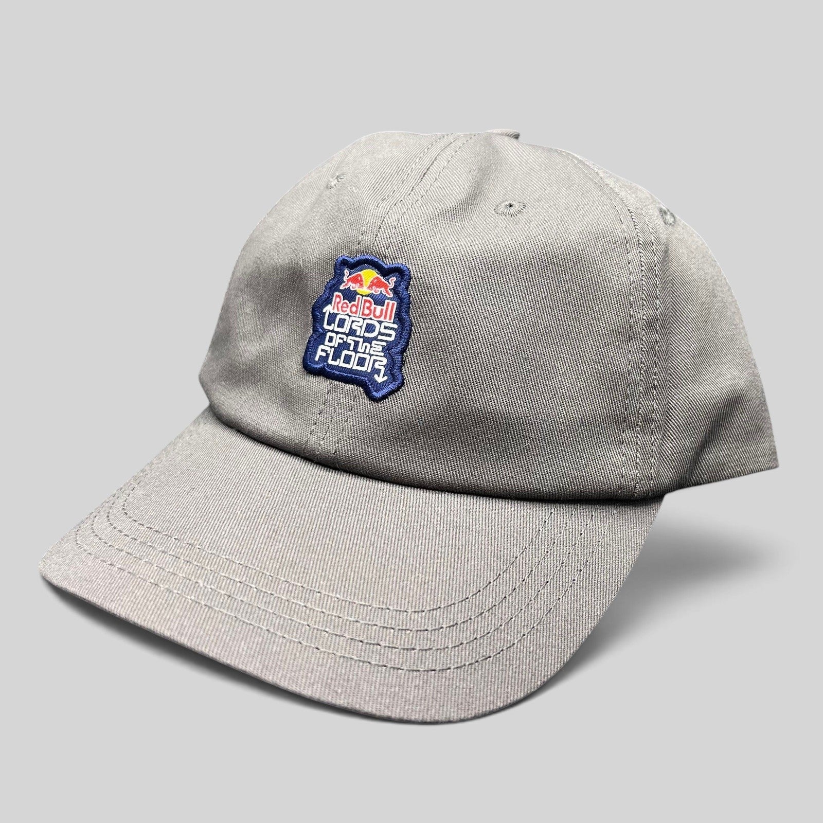 Raree Finds grey cotton twill snapback hat featuring a Red Bull Lords of the Floor embroidered event patch.