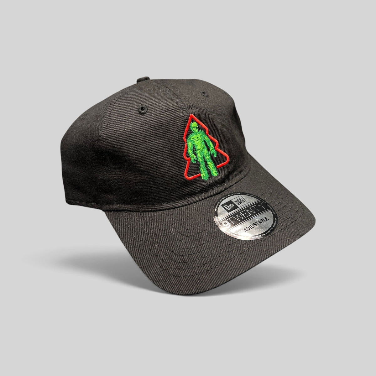 Raree Finds black New Era 9TWENTY cotton cap featuring a green Groot Christmas tree embroidery on the front.